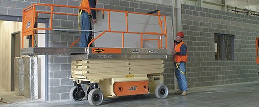 Scissor lift being used inside a building