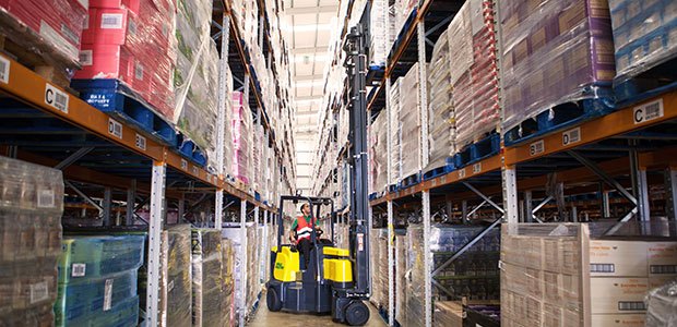 Aisle Master forklift working in a warehouse