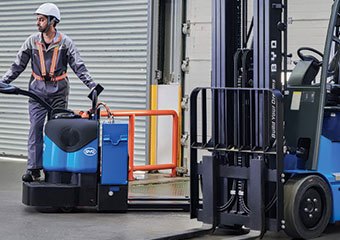 Man using an electric BYD pallet jack