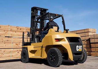 CAT diesel forklift hauling lumber