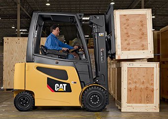 CAT electric forklifts working in a warehouse
