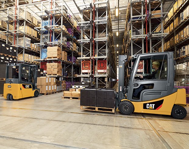Electric Cat forklifts in a warehouse