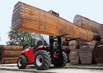 Manitou forklift hauling lumber