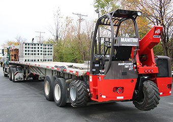 Manitou truck mounted forklift attached to a truck
