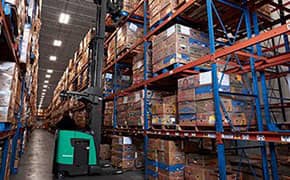 Operator training of a reach truck in a warehouse