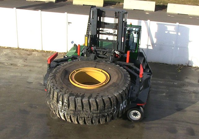 Combilift tire manipulator attachment for the mining industry