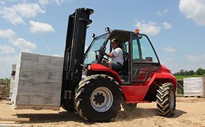 Manitou rough terrain forklift working on a construction site
