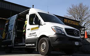 Leavitt Machinery service truck servicing different types of equipment