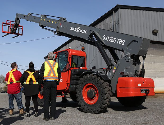 Private telehandler training session with three operators
