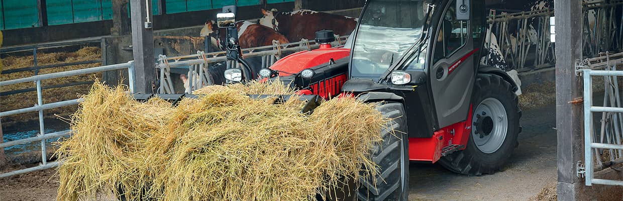 Manitou equipment moving hay