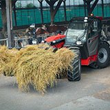 Manitou equipment moving hay