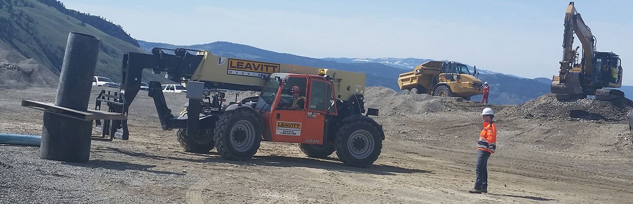 Telehandler working at heavy metal rocks youth program