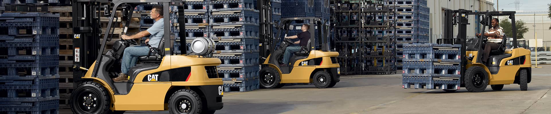 New Cat forklift equipment working in a yard