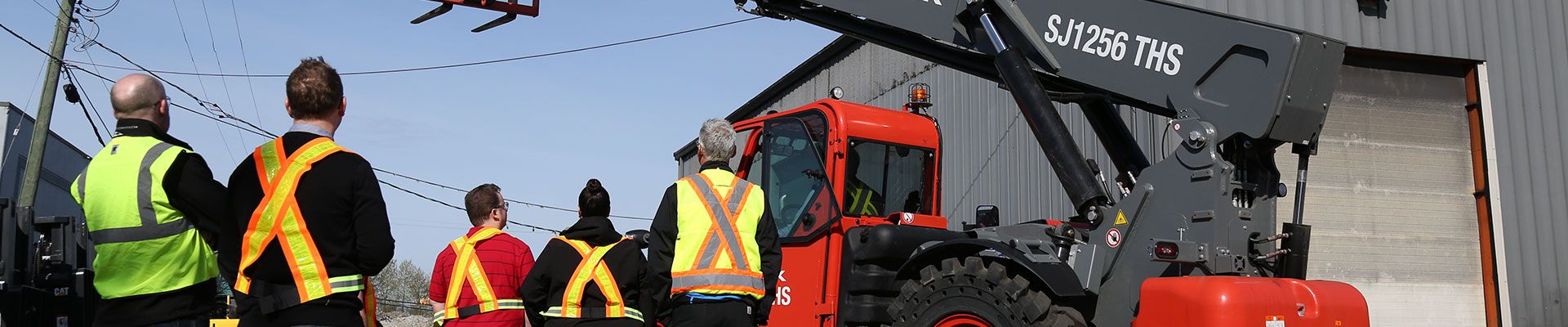 People doing on-site telehandler training