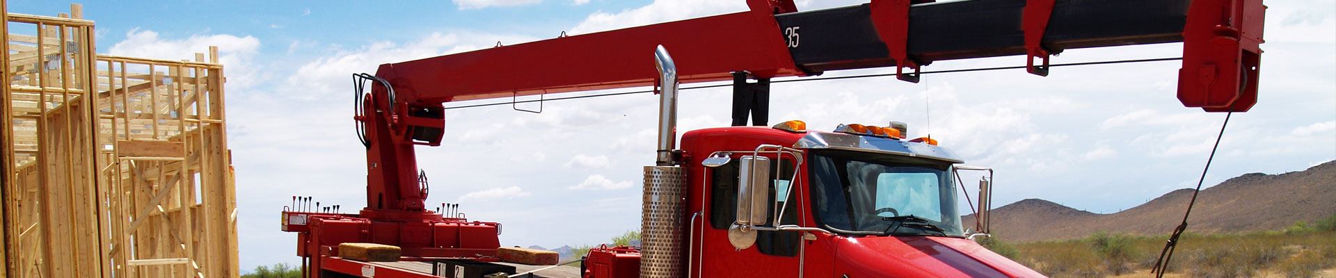 Boom truck operating on a construction site