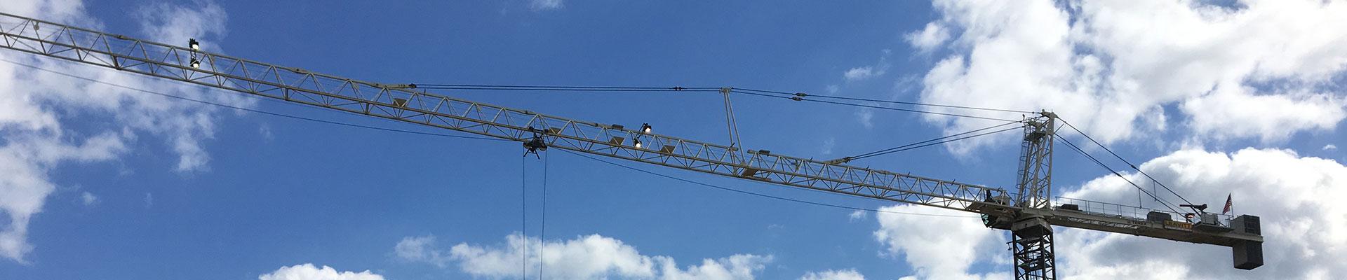 Crane load chart training on a sunny day