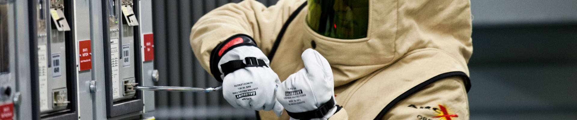 Electrical worker wearing protective gear while working