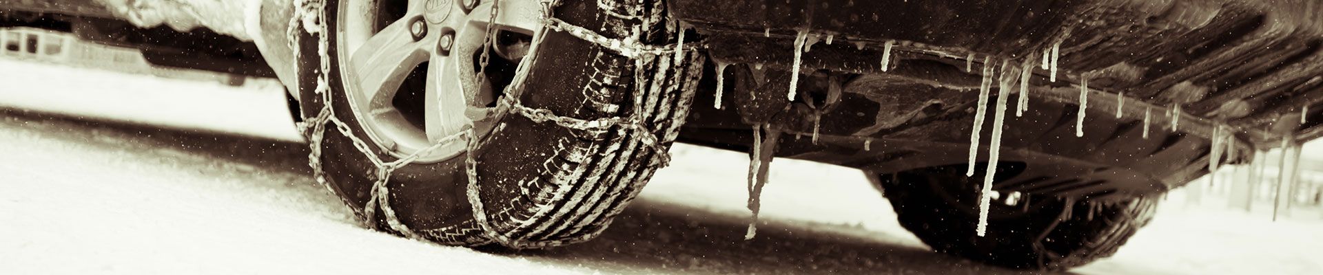 Car with chains on the tire training for winter driving