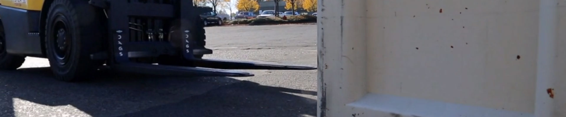 Magnetic fork pads on a forklift