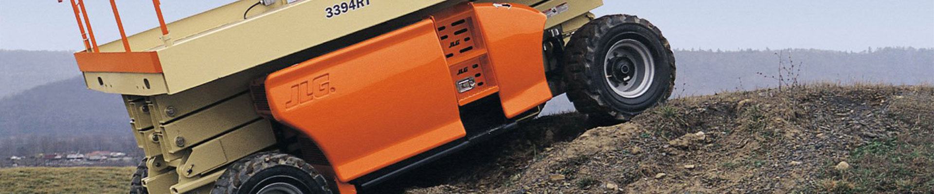 Rental of a JLG rough terrain scissor lift on a construction site