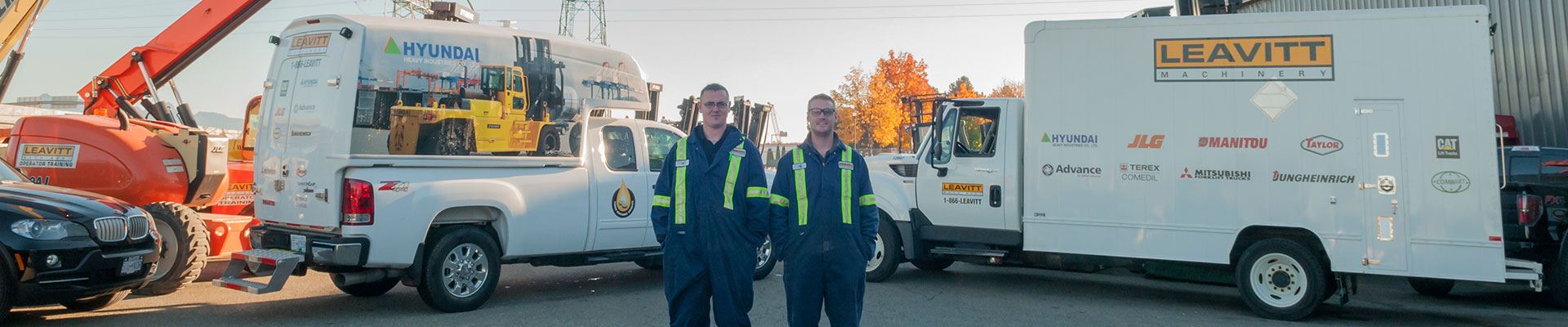 Technicians servicing equipment