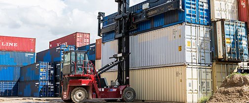 Taylor container handler hauling containers