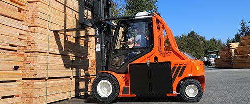 New Carer high capacity forklift hauling lumber