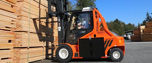 High capacity Carer electric forklifts hauling lumber