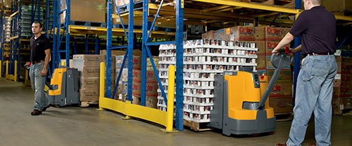 Jungheinrich electric pallet jacks working in a warehouse