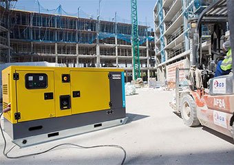 Atlas Copco generator being used on a construction site