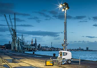 Atlas Copco light tower being used at a port