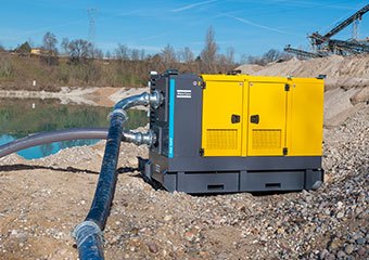 Atlas Copco dewatering pump used on a construction site