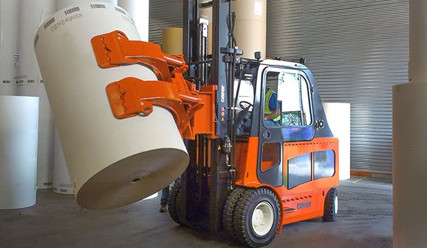 Carer electric forklifts hauling paper