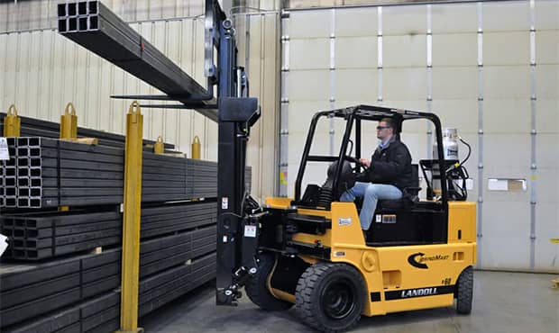 Drexel forklift lifting steal in a warehouse