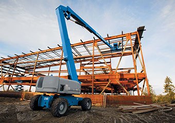 Genie boom lift being used on a construction site
