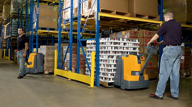 Jungheinrich electric pallet jacks working in a warehouse