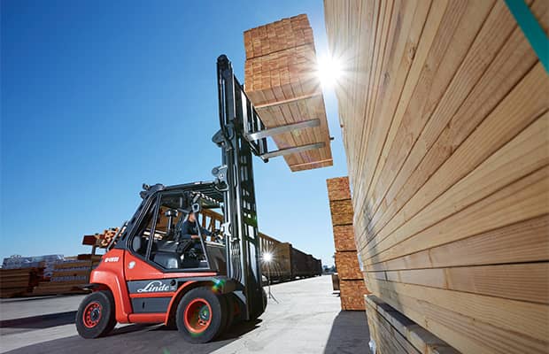 Manitou skid loader hauling gravel