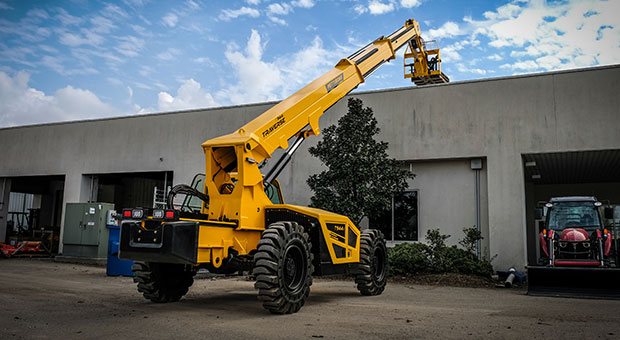 Pettibone telehandler working with a building