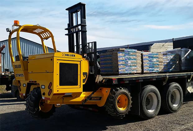 Sellick truck mounted forklifts on the back of a truck