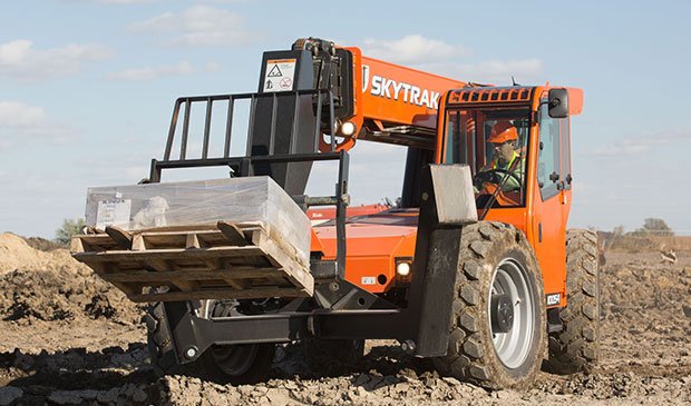 SkyTrack telehandler moving thorough rough terrain