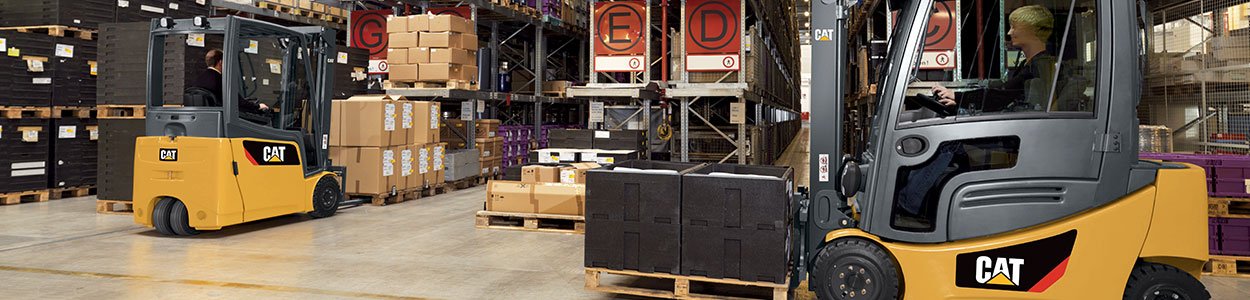 Electric CAT forklifts used in a warehouse