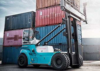 Loaded container handler working in a port