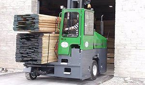 New combilift equipment hauling lumber