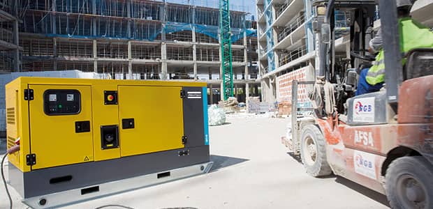 Diesel generator working on a construction site after having parts replaced