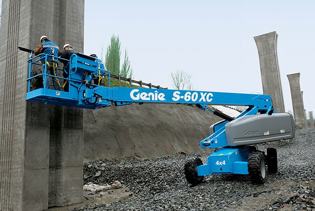 Rental of a straight boom lift working in a yard