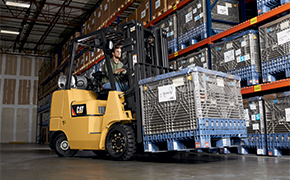 A CAT cushion tire forklift rental used in a warehouse