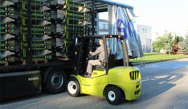 Rented forklift working in a yard