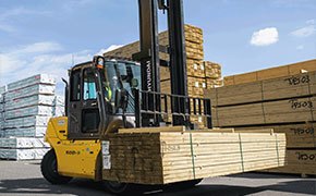 A pneumatic Hyundai forklift rental used at a lumber yard