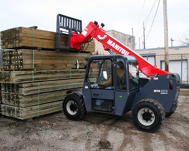 Rental of a Manitou MTA telehandler hauling lumber