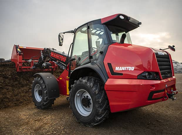 Manitou loader rental moving dirt